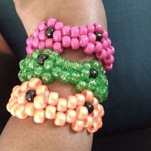 I am listing a handcrafted Kandi beads froggy look like bracelets
